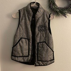 Small boutique monogrammed vest. Monogram is LEB.